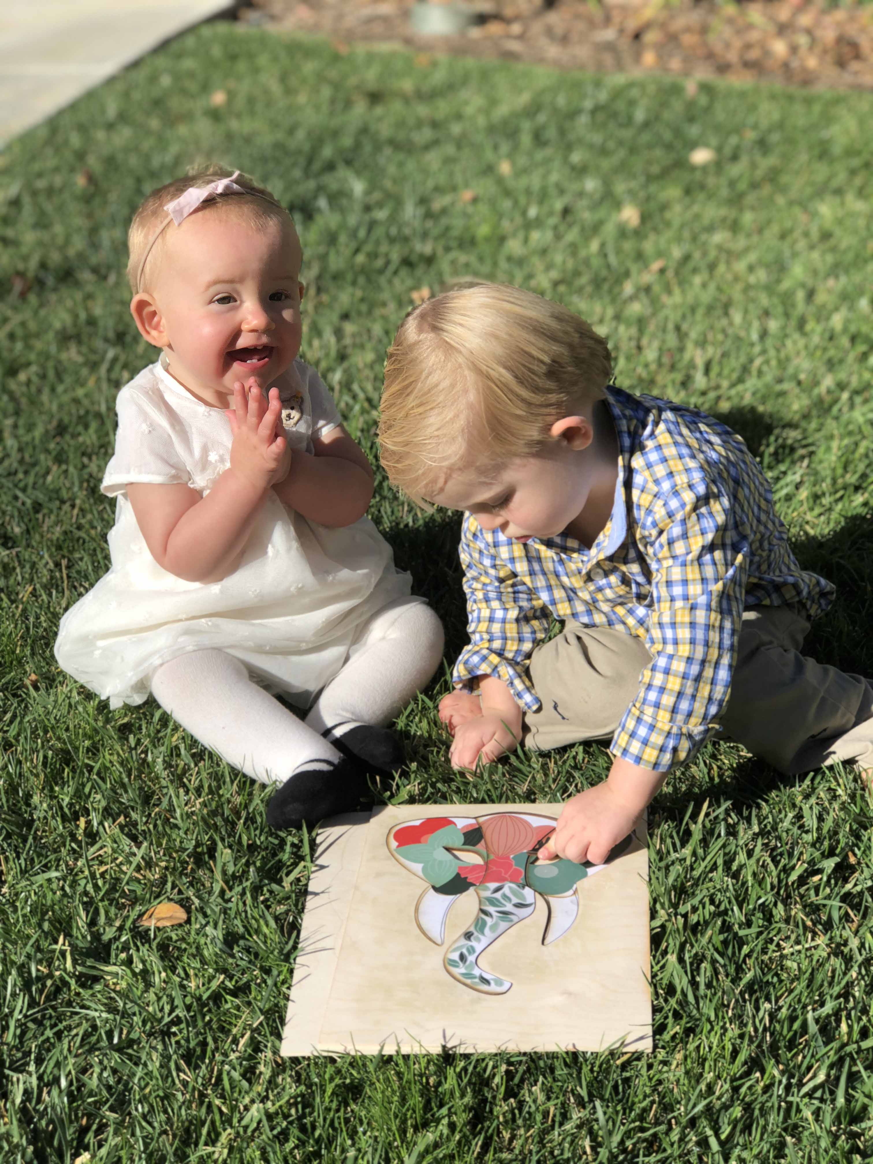 Child interacting with puzzle pieces